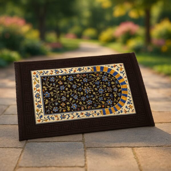 "Brown prayer mat with a soft, textured surface and subtle geometric pattern, laid flat on a clean floor."