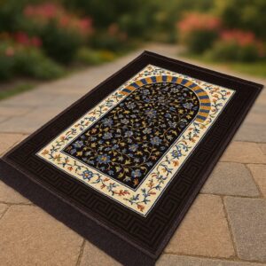 "Brown prayer mat with a soft, textured surface and subtle geometric pattern, laid flat on a clean floor."